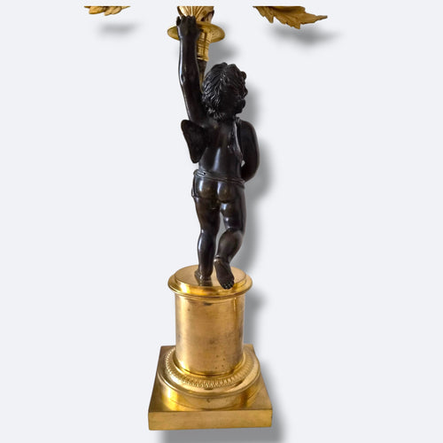 Paire de candélabres aux amours en bronze patiné et doré – XIXe - Style Empire